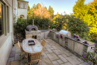 outdoor kitchens can include a stone pizza oven